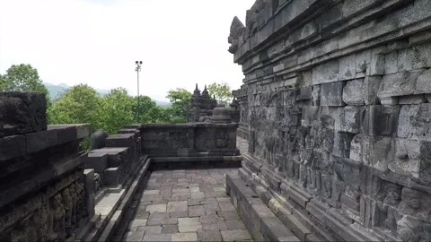 Stupa and Bas Relief on the wall, Borobudur Temple Terrace, Java, Indonesia Stock Footage 308740328