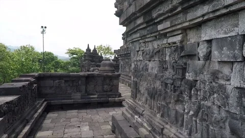 Stupa and Bas Relief on the wall, Borobudur Temple Terrace, Java, Indonesia Vídeos de archivo 308740514