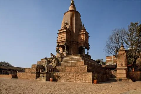 Stupa temple with stone sentinals either side of the steps Stock Photos