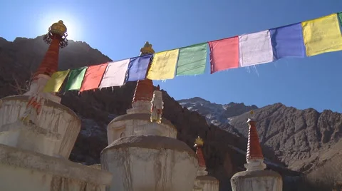 Stupas and prayer flags at background of Himalayan Mountains in Ladakh, India Stock Footage 45427946