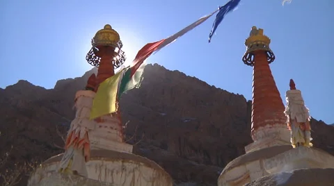 Stupas and prayer flags at background of Himalayan Mountains in Ladakh, India Stock Footage 45428069
