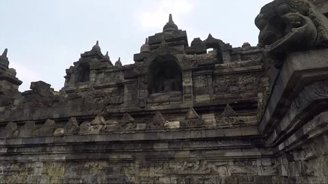 Stupas, Buddha Statue, Bas Reliefs, Borobudur Temple Terrace, Java, Indonesia Stock Footage 242439729