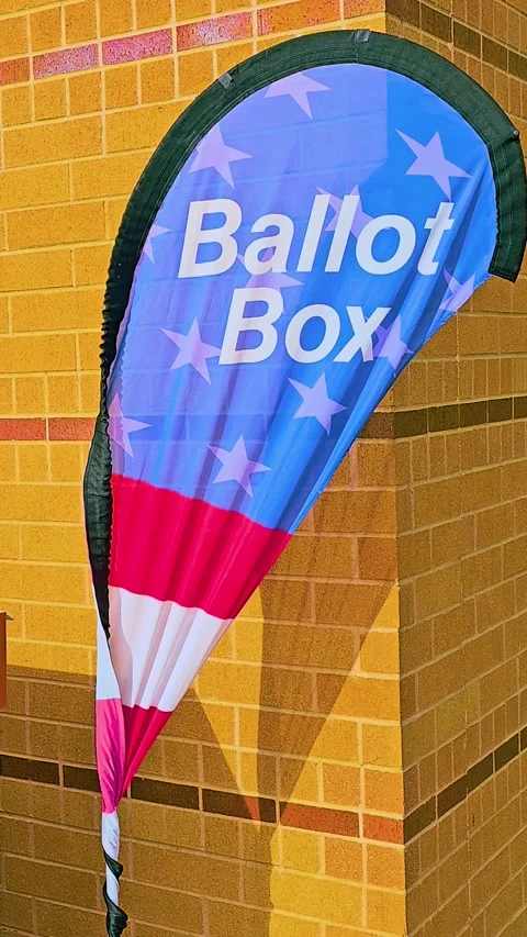 Sturdy Mail-In Voting Drop Box with Bilingual Election Signage Vertical Stock Footage 320110043
