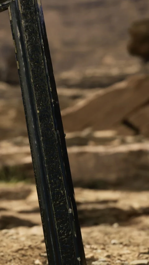 Sturdy tool rests against the rugged earth under warm sunlight Stock Footage 335096696