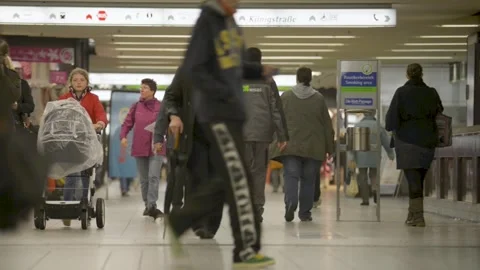 Stuttgart, Germany - 06/13/2023: Crowded subway station scene with diverse Stock Footage 276580942