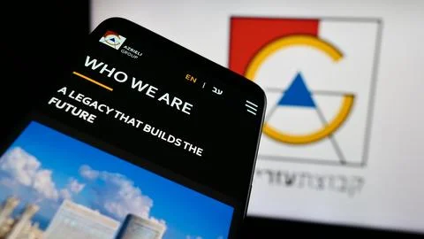 Stuttgart, Germany - 07-08-2024: Mobile phone with website of Israeli real es Stock Photos