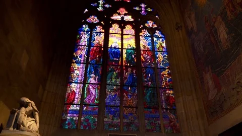 St.Vitus Cathedral colorful stained glass window art. Prague. Dolly shot. Stock Footage