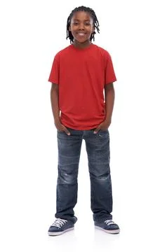 Stylin little dude. A young African boy standing with his hands in his pockets Stock Photos