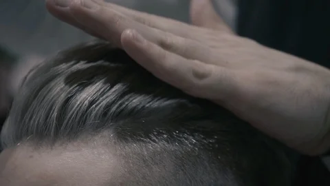 Styling man's hair Stock Footage 87745950