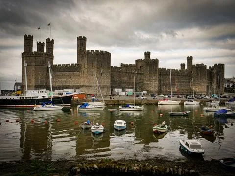Stylised Caernarfon castle with reflection over the river, circa September 2021 스톡 사진