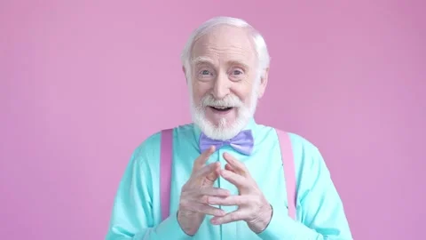 Stylish aged man impressed present party isolated pastel color background Stock Footage 190911868