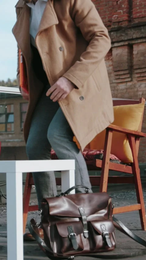 A Stylish and Comfortable Outdoor Seating Area Featuring Cozy Cushions and a Stock Footage 313778758
