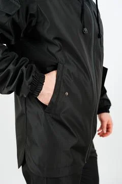 This stylish and highly functional black jacket features convenient pockets.. Stockfoto's
