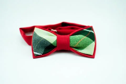 Stylish and well-designed red-green bow-tie on a white background; isolated Foto stock
