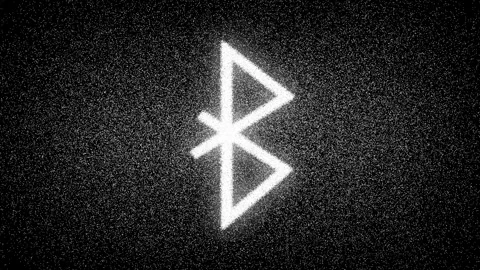 Stylish animated Bluetooth icon adorned with glittering particle highlights.. Stock Footage 313428099