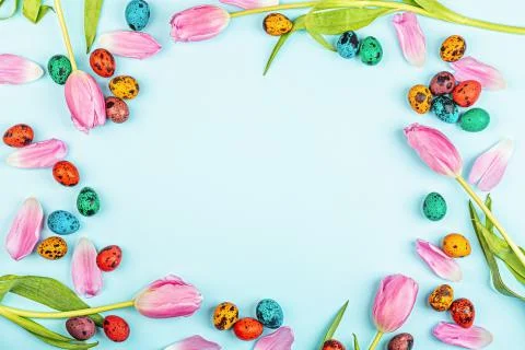 Stylish background with colorful easter eggs isolated on blue background with Stock Photos