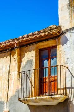 Stylish balcony with a metal railing, solid architectural element, a place of Stock Photos