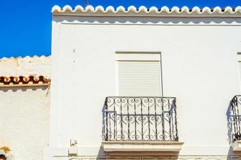 Stylish balcony with a metal railing, solid architectural element, a place Stock Photos