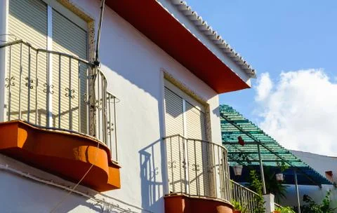 Stylish balcony with a metal railing, solid architectural element, a place Foto stock
