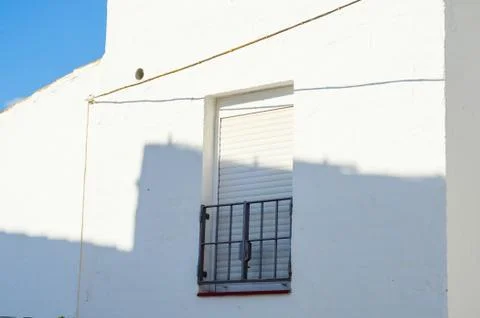 Stylish balcony with a metal railing, solid architectural element, a place Stock Photos