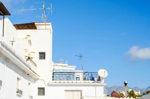 Stylish balcony with a metal railing, solid architectural element, a place Stock Photos