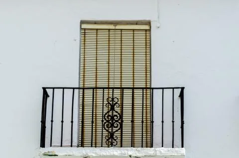 Stylish balcony with a metal railing, solid architectural element, a place of Stock Photos