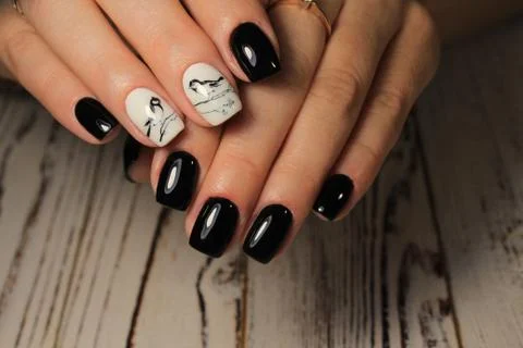 Stylish black nails Stock Photos