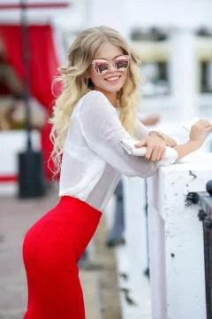 Stylish blonde at the dinner break. Stock Photos