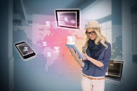 Stylish blonde using tablet pc with connecting devices Stockillustratie