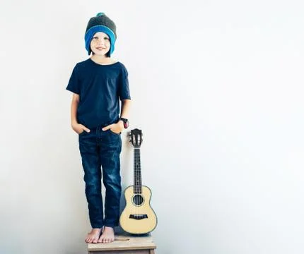 Stylish boy with ukulele Foto stock