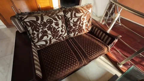 Stylish brown fabric sofa featuring a contemporary design Stock Footage 280912268