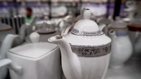 Stylish ceramic kettle for serving tea Stock Footage 320958792