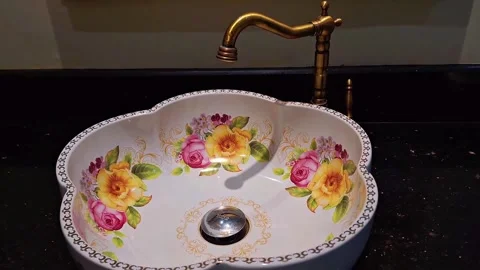 Stylish Ceramic Sink. Chic Bathroom Decor. Gold Faucet Sink Stock Footage 321817291