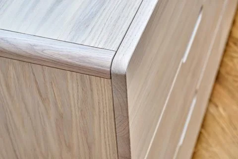 Stylish chest of drawers with bleached solid oak in room Stock Photos