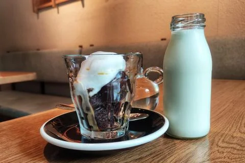 Stylish chic coffee block with soft cream. ice cool block of black coffee wit Stock Photos