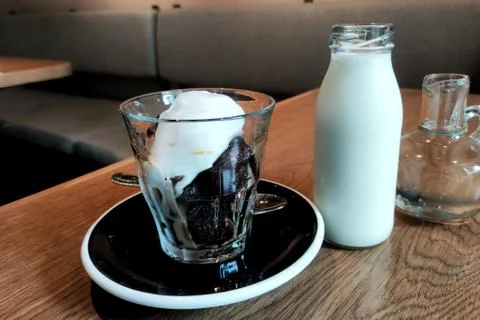 Stylish chic coffee block with soft cream. ice cool block of black coffee wit Stock Photos