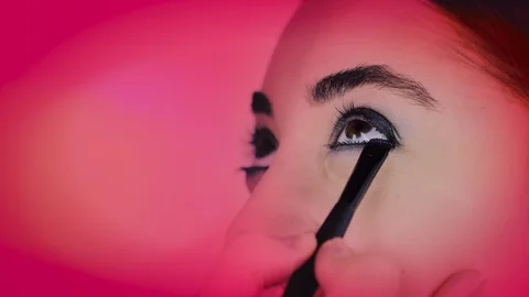 Stylish Close Up Shot of Makeup Using Mascara on Young Girl's Eyes Stock Footage 129383856