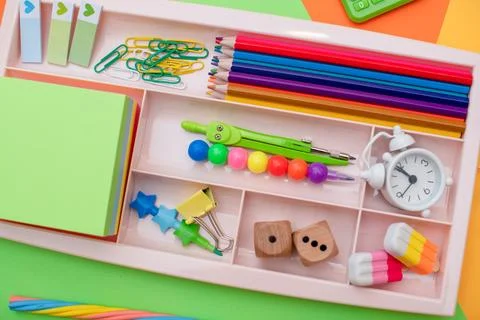 Stylish colored stationery. Workplace. Organization of a drawer at the workplace Stock Photos