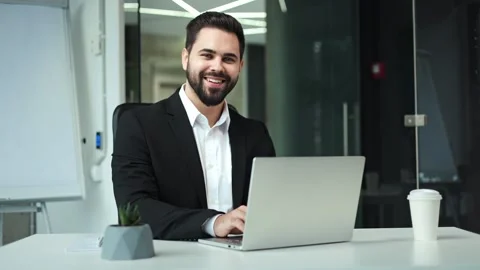 Stylish creative designer typing personal business plan on laptop in office Video stock 259022790