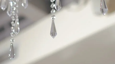 Stylish crystal chandelier on fashion ceiling Stock Footage
