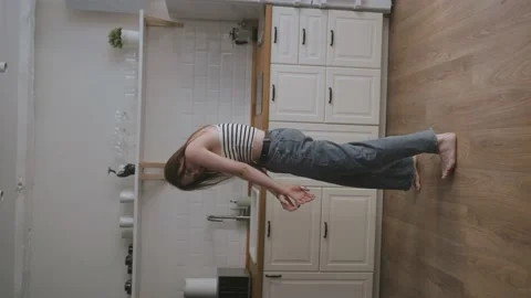 A stylish dancer dancing at home. Cool party at home. Alone. Stock Footage 158158696