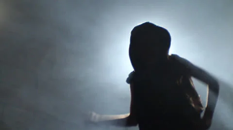 A Stylish dancer does the powerful dance in beyond light set location Stock Footage 22774857