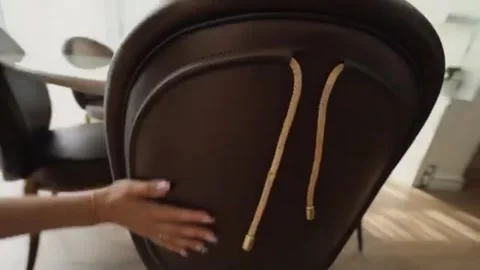 Stylish Dining Setup with Cushioned Chairs Sunlit Ambience Stock-Footage 319519774