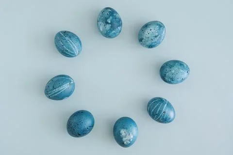 Stylish Easter background with blue Easter eggs in the shape of a circle on a Stock Photos