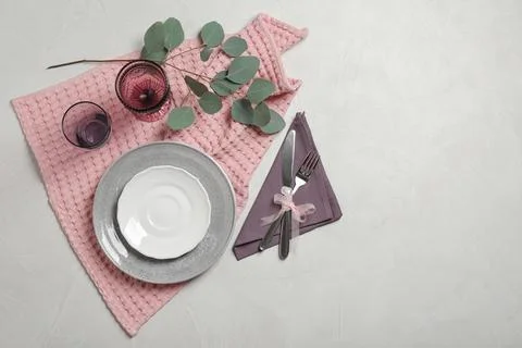 Stylish elegant table setting on light background, top view. Space for text Stock Photos