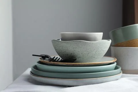 Stylish empty dishware and cutlery on table indoors Stock Photos