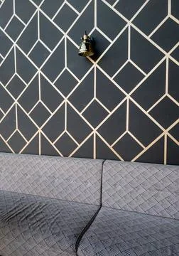 Stylish fabric sofa in elegant interior Stock Photos