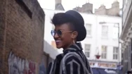 Stylish Fashion Blogger Walking Along Urban Street Stock Footage