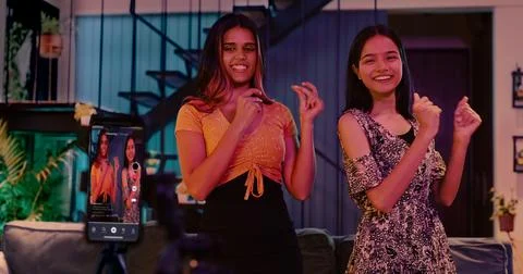Stylish friends making dance vlog at indoor home Stock Photos