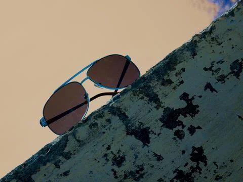 Stylish goggle side frame shot with sky sun light background Stock Photos